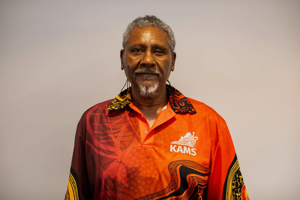 Professional headshot of Louie Bin Maarus, KAMS staff member.